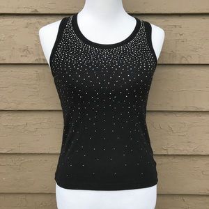 A black tank top with sparkles covering it